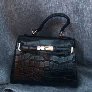 Black croc mini handbag